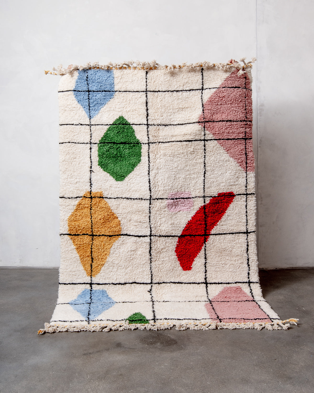 Modern, designer, handcrafted Berber rug from Morocco. Beniourain carpet with beautiful colours and patterns and fluffy wool texture.